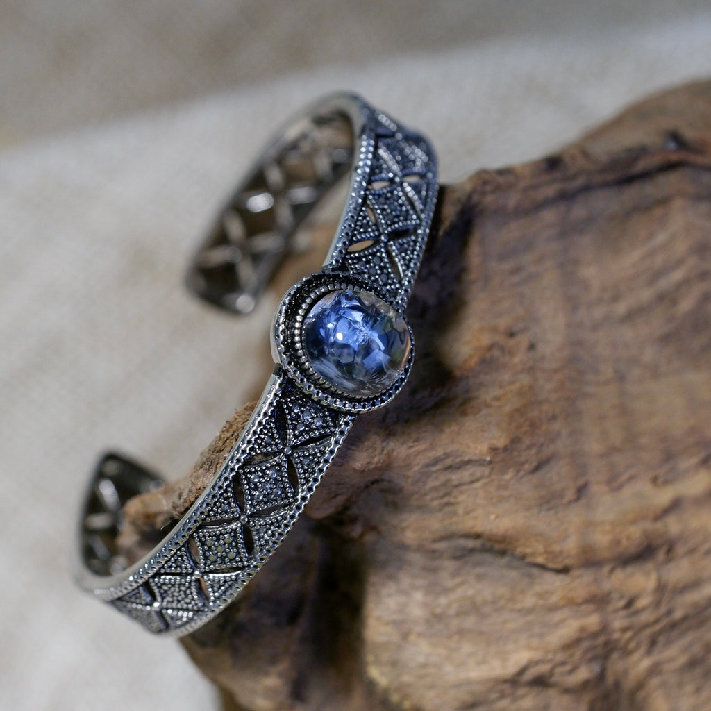 "Azure Filigree" — Blue Mineral Quartz Cabochon & Openwork Silver Bangle