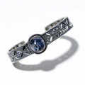 "Azure Filigree" — Blue Mineral Quartz Cabochon & Openwork Silver Bangle